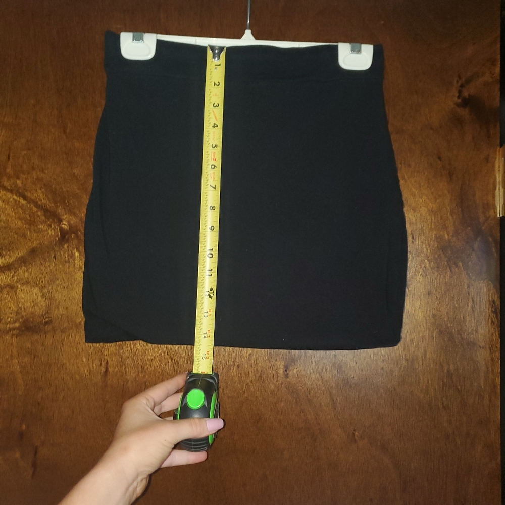 Fashion Nova black mini skirt.